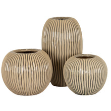 Load image into Gallery viewer, Set of three beige ceramic vases with ribbed texture on a white background
