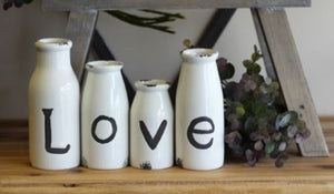 Set Of 4 'LOVE' Milk Bottle Decorations